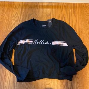 A black Hollister cropped shirt